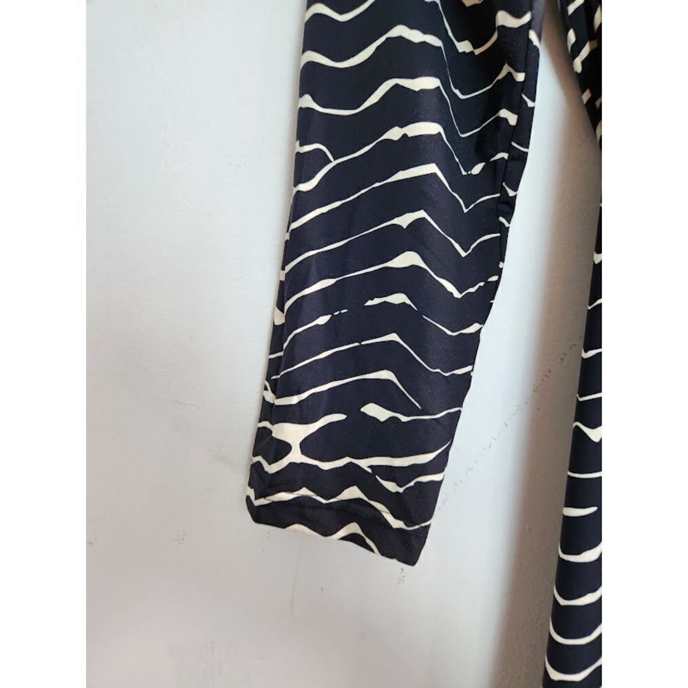 ❎ DONATED ❎
Ellie Kai " The Abby" Black & Ivory Print Jersey Knit Wrap Dress